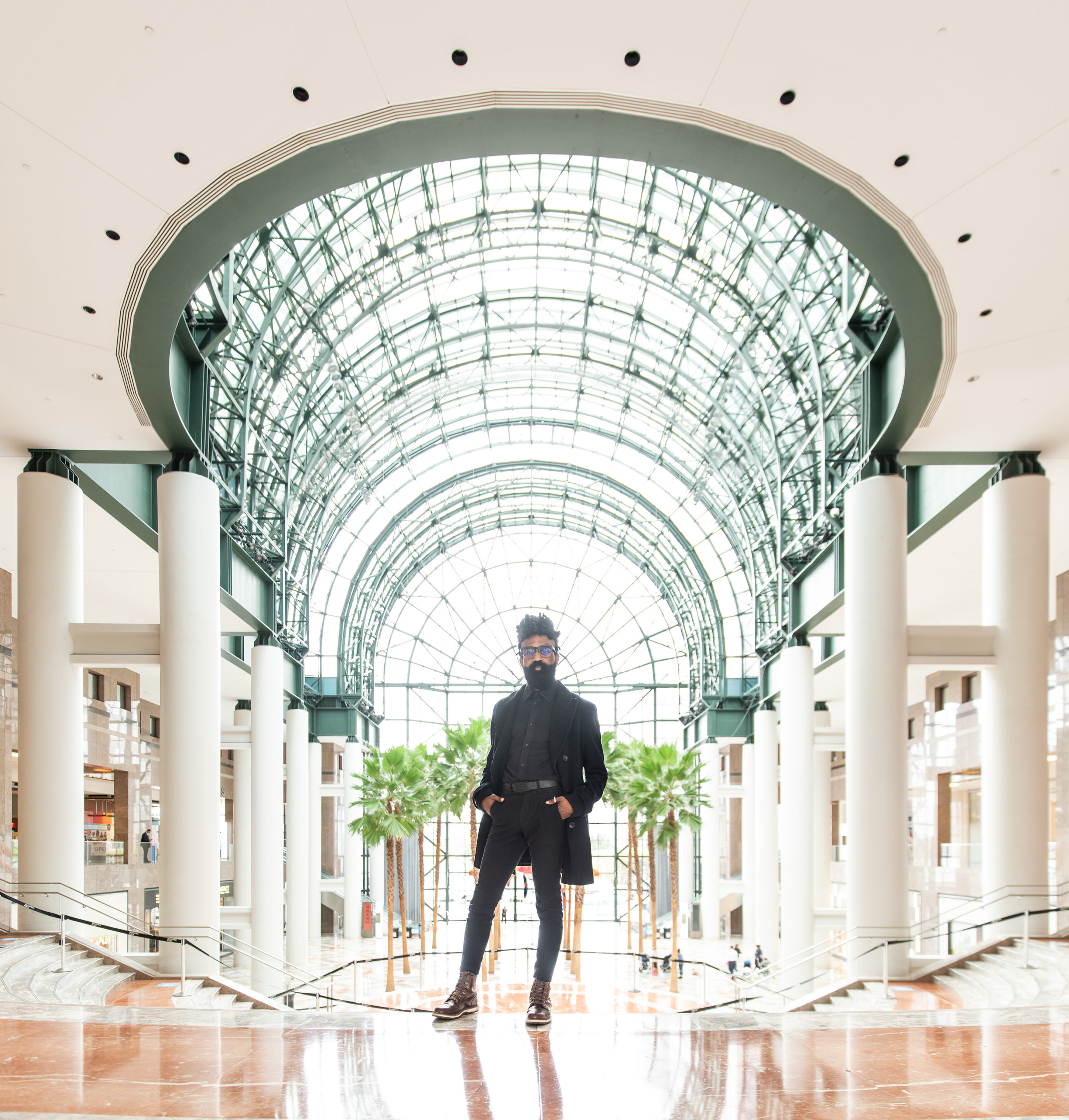 Kendal Henry standing in Brookfield Place NY atrium
